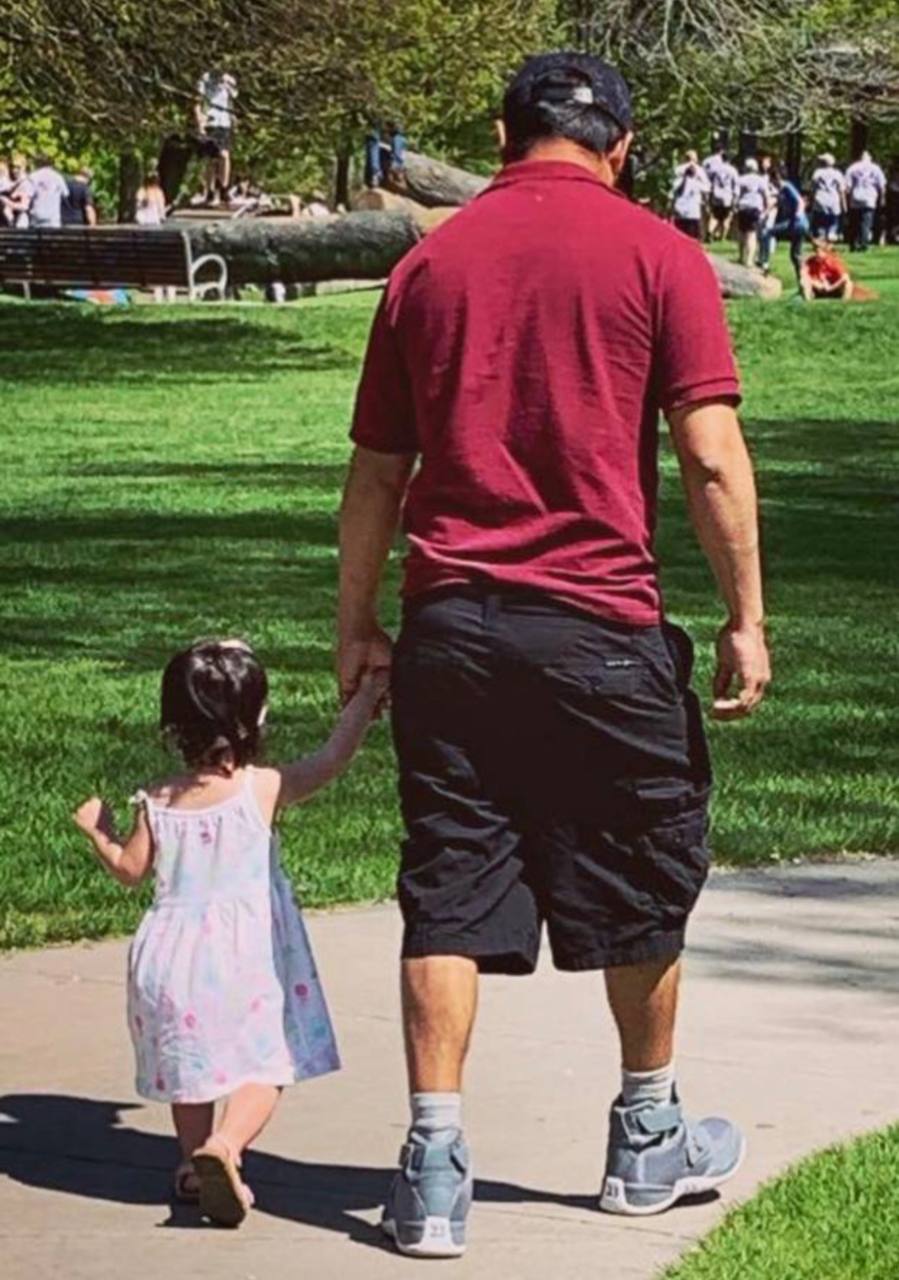 Walking with daughter in the park